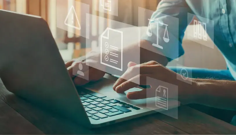 man on computer with transparent files appearing above keyboard