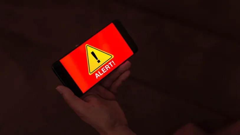 mobile phone message that say "alert"