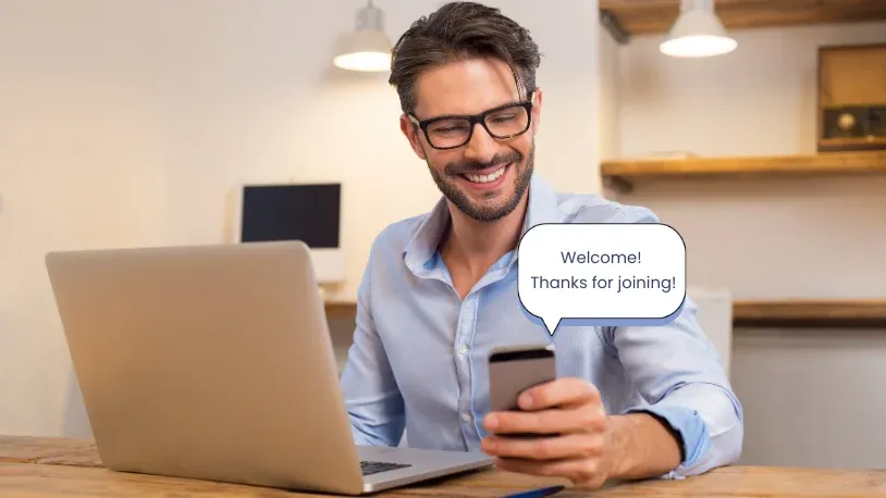 Man looking at his mobile phone messages